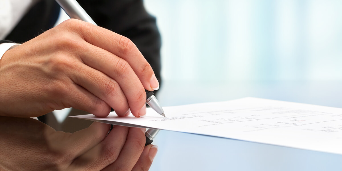Man Signing Legally Binding Contract